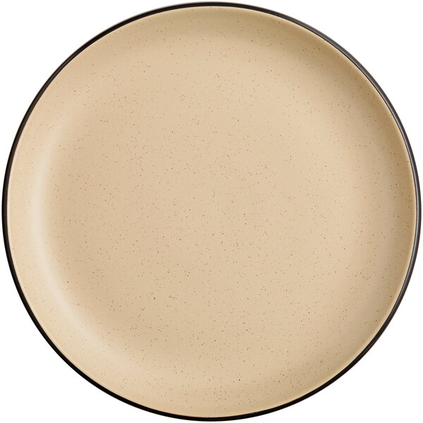 An Acopa Harvest Tan matte coupe stoneware plate with a black rim.