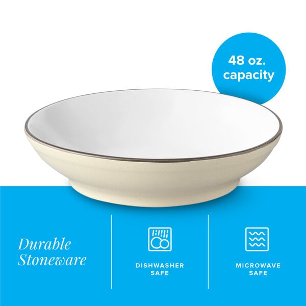 A cream white matte stoneware pasta bowl with a 48 oz. capacity.