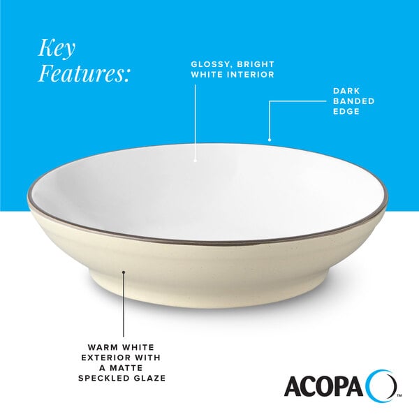 A cream white matte stoneware pasta bowl with a glossy white interior and a dark banded edge.