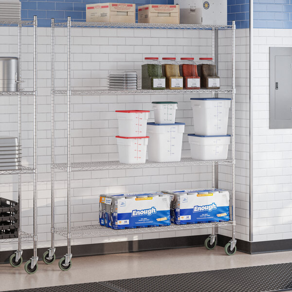 A chrome four-shelf storage rack with casters, holding various containers and supplies.