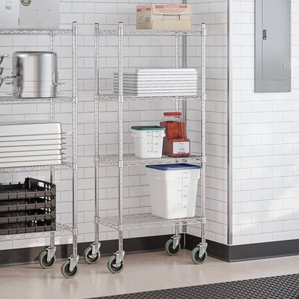 A chrome 4-shelf wire shelving unit with casters and various kitchen storage items placed on the shelves.