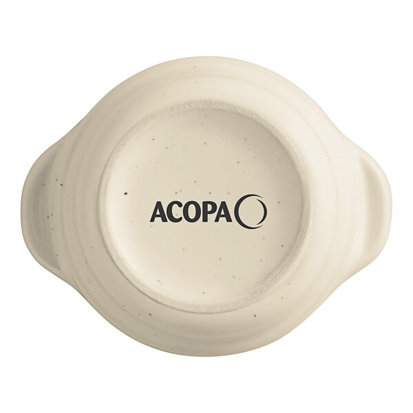 A white Acopa stoneware sauce cup with black text that reads "Embers"