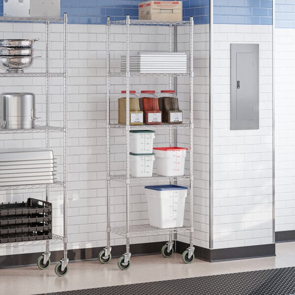 A chrome 5-shelf wire shelving unit with casters, used for storage in commercial or industrial settings.
