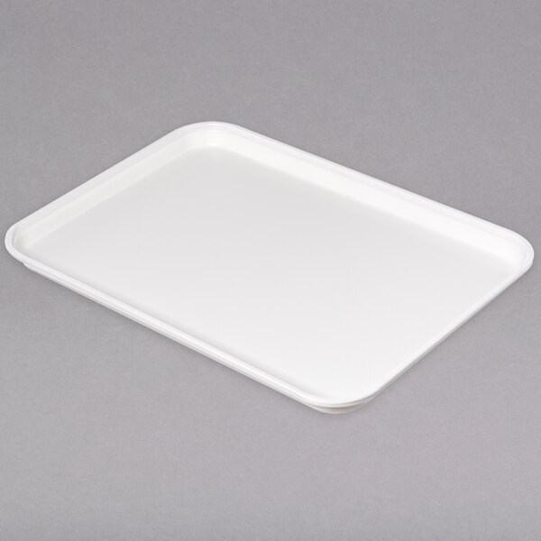 A white Carlisle fiberglass market tray.