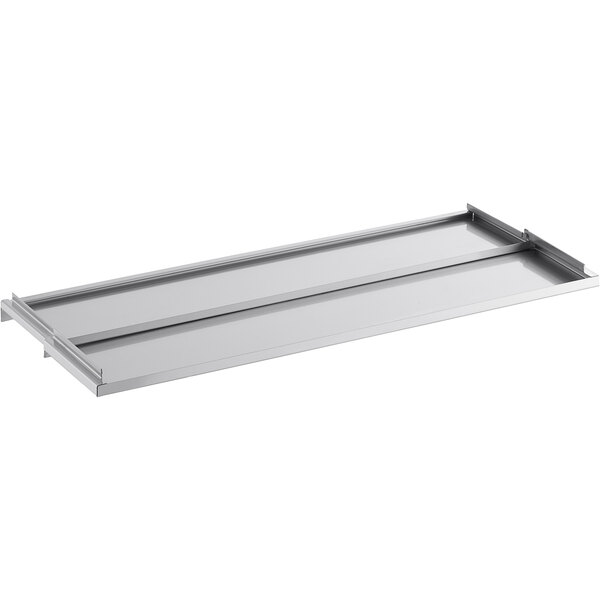 A Regency stainless steel sliding lid for an ice bin on a counter.