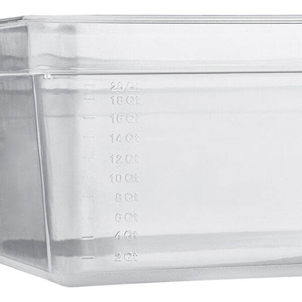 A Vigor translucent polypropylene food pan on a counter.