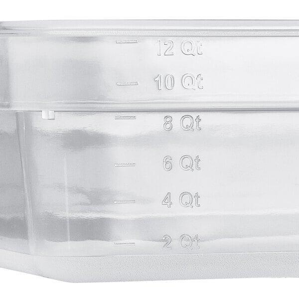 A clear plastic Vigor food pan with measurements.