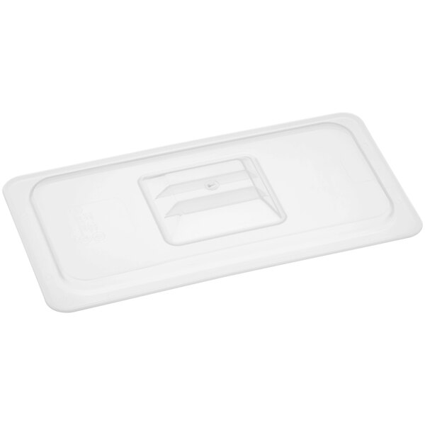 A translucent plastic lid with a square handle.