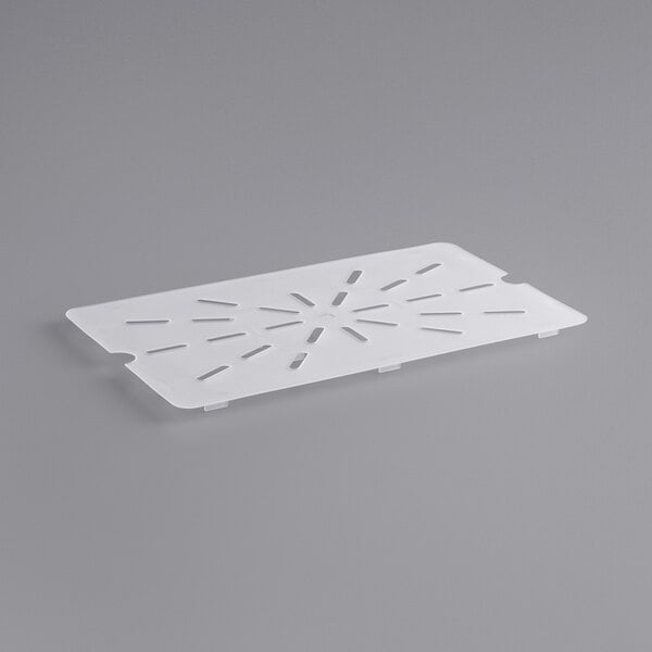A translucent white plastic drain tray with holes.