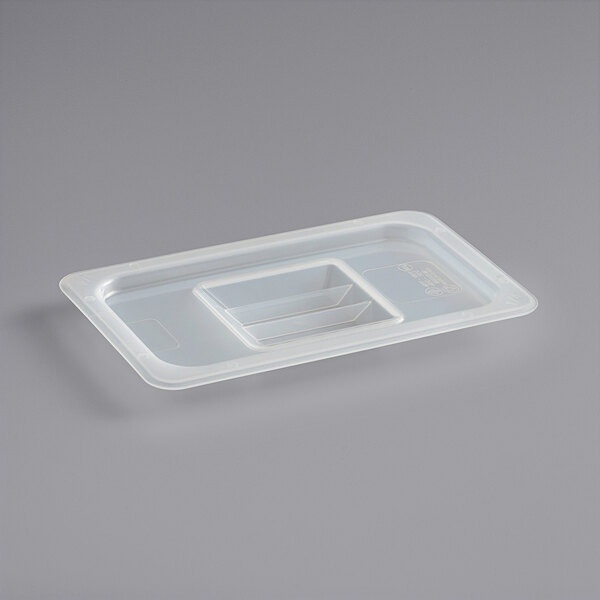 A translucent plastic container lid with handles.