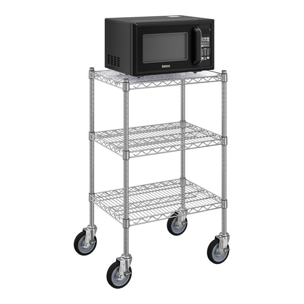 A Galaxy chrome microwave station with shelves and casters.