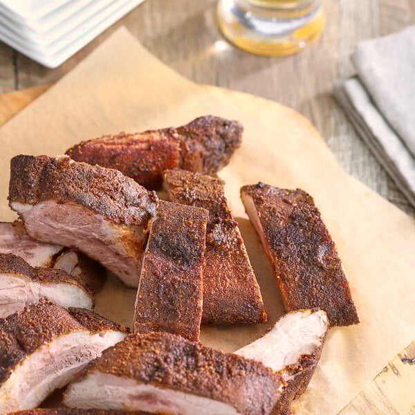 A plate of ribs seasoned with Regal Smoky Chipotle Dry Seasoning.