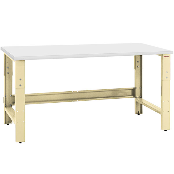 A white rectangular workbench with a beige metal frame.