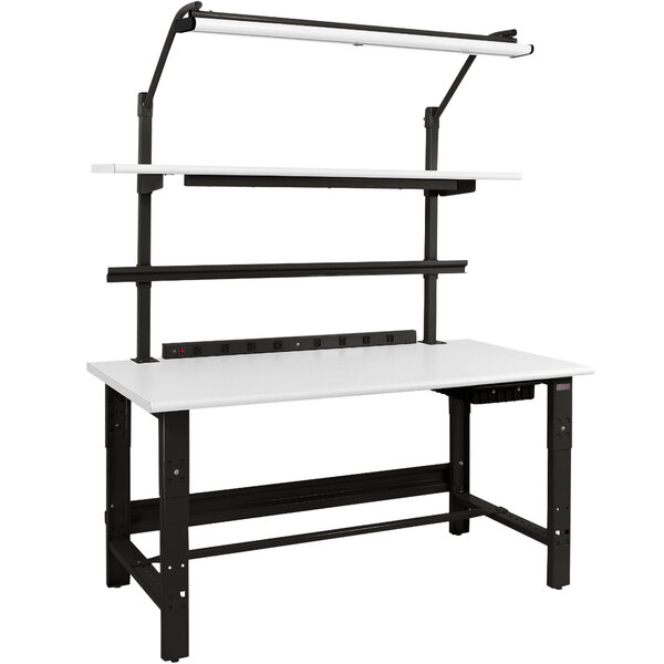A white workbench with a black frame and round front edge.