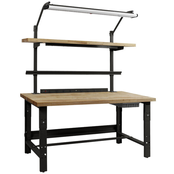 A wooden BenchPro workbench with black legs and a light on top.