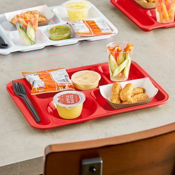 A red Choice left handed compartment tray with food on it.