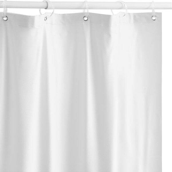 A white American Specialties, Inc. shower curtain hanging on a rod.