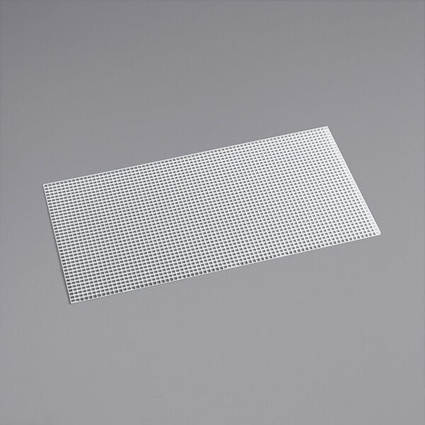 A white rectangular plastic eggcrate louver with small squares on a gray background.