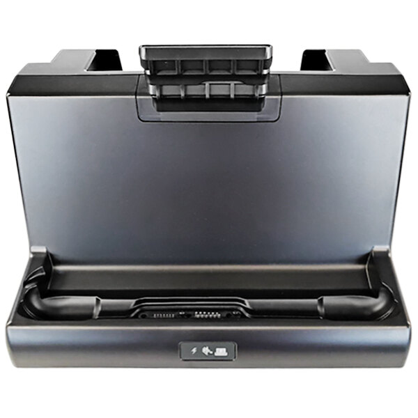 A black Zebra docking station with a silver charging port.