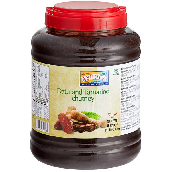 A case of four jars of Ashoka Date and Tamarind Chutney with a white label.