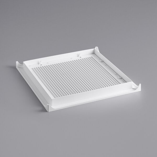 A white American Louver Company Stratus return grille for a square duct with holes.