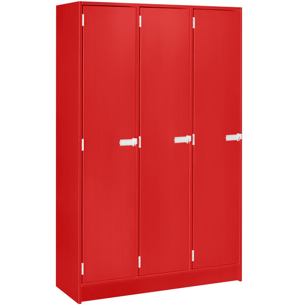 A red metal locker with three doors and white handles.