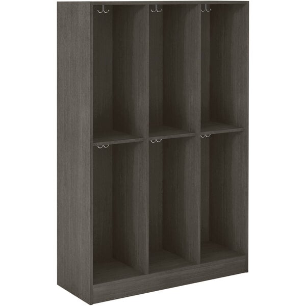 A dark elm storage locker with many shelves and hooks.