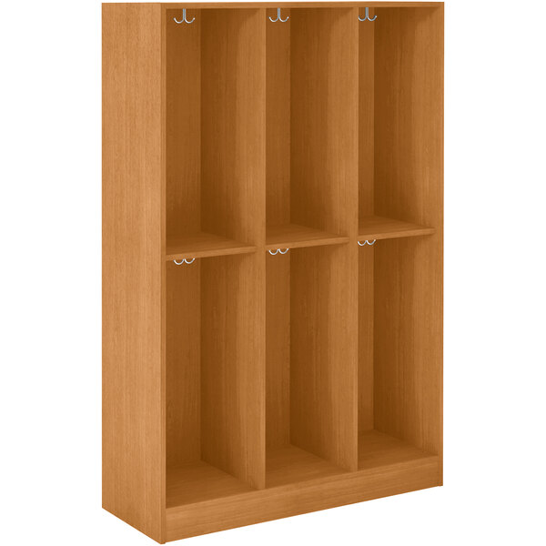 A light oak wooden locker with four doors and shelves.