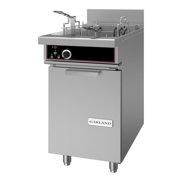 A commercial electric floor fryer with a stainless steel exterior and control panel, featuring a basket and labeled with the Garland brand.