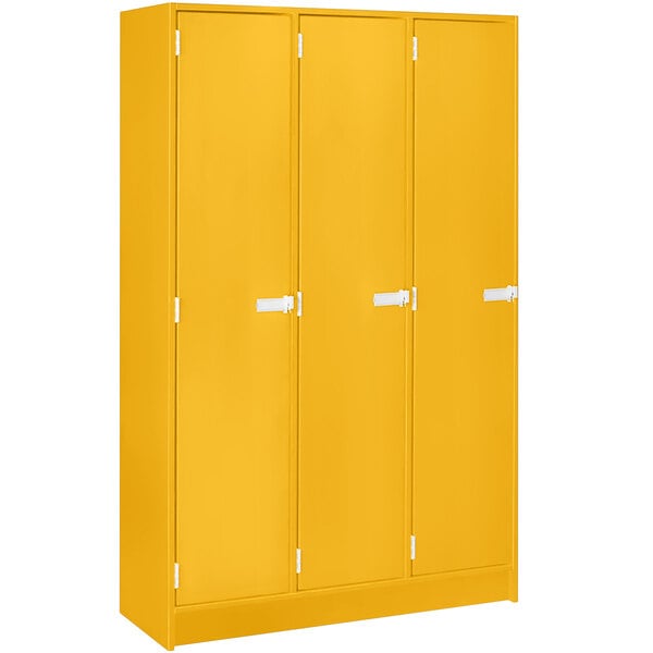 A sun yellow metal locker with three white doors.