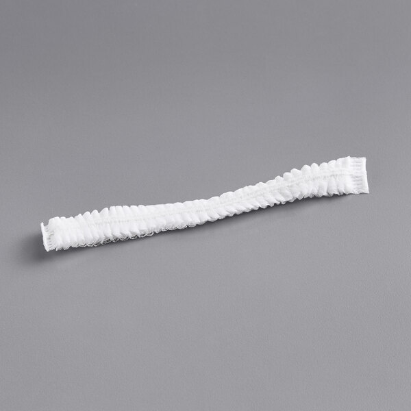A white fabric strip on a gray background.