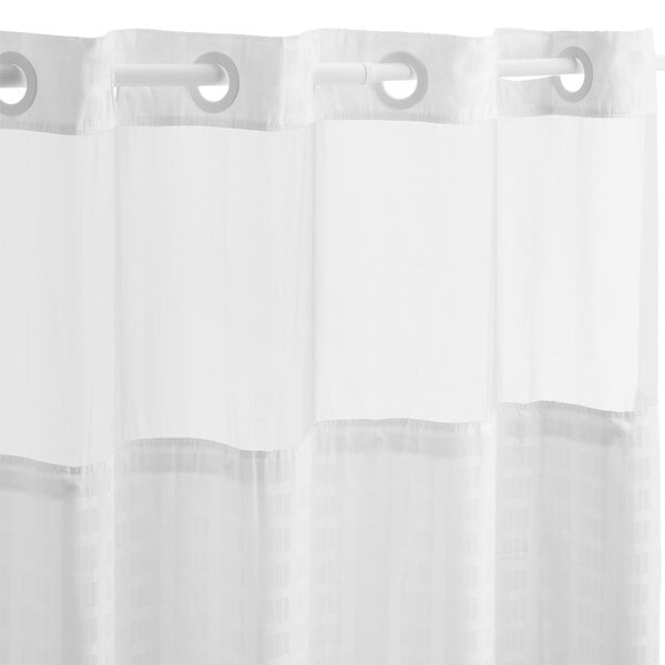 A white Hookless shower curtain with rings.