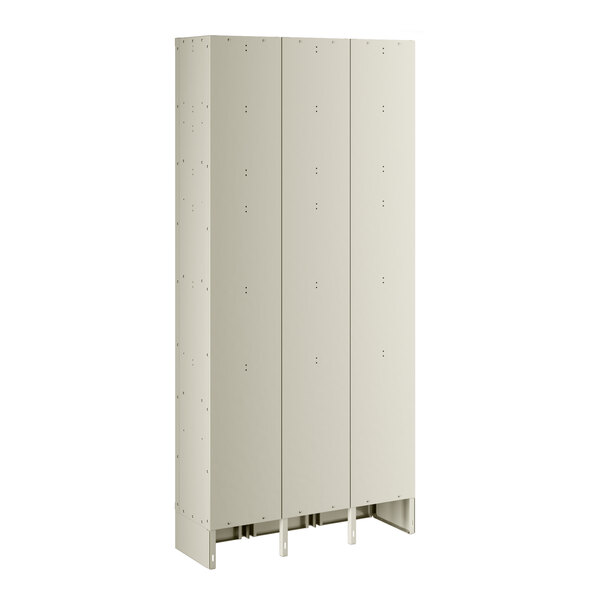 A beige Regency locker with three wide doors and four tiers.