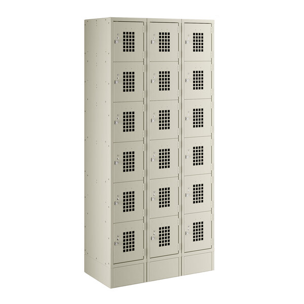 A beige Regency metal locker with 6 compartments.