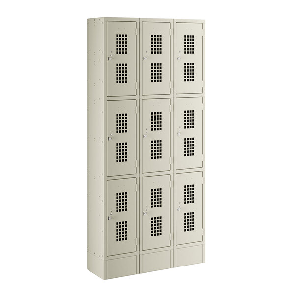 A beige Regency 3 wide, 3 tier locker with six doors.