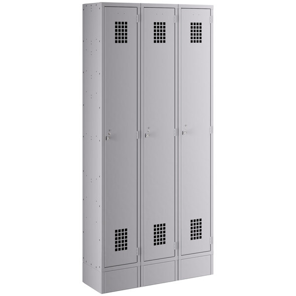 A gray metal Regency locker with silver doors.