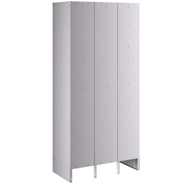 A gray metal Regency locker with three wide doors.