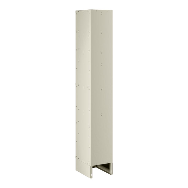 A beige rectangular locker with holes in it.