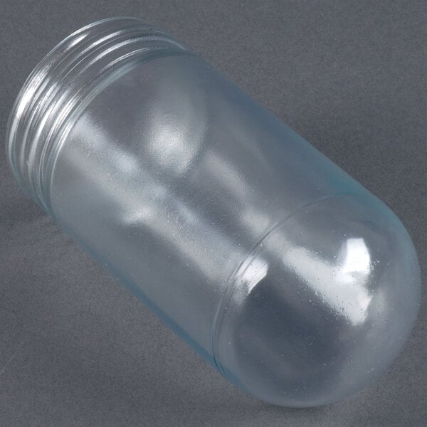 A clear plastic jar with a metal cap.