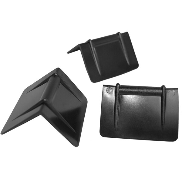 A group of black plastic corners with a rectangular shape.