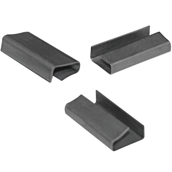 A close-up of three black plastic Lavex snap-on seals for poly strapping.