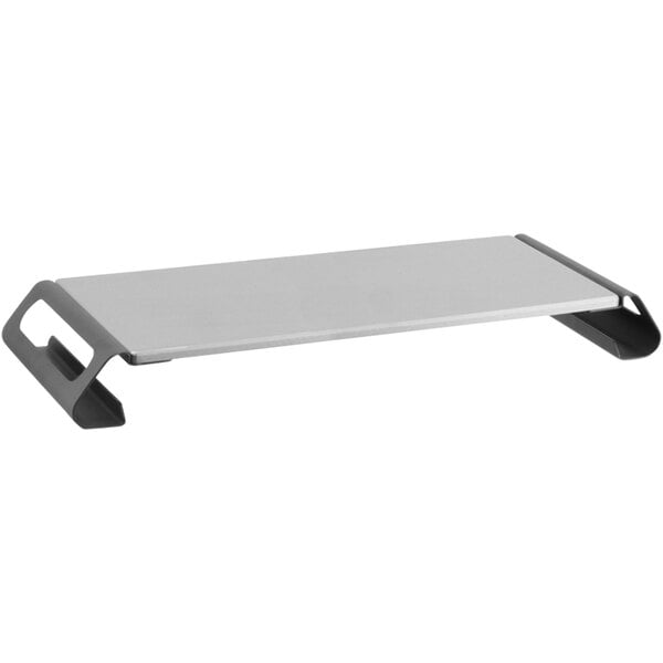 A grey rectangular monitor riser with black metal legs.