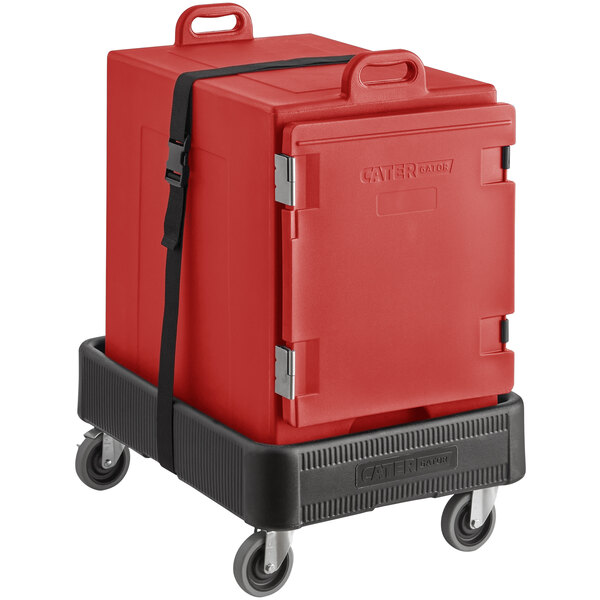 A red CaterGator insulated food pan carrier on a black cart.