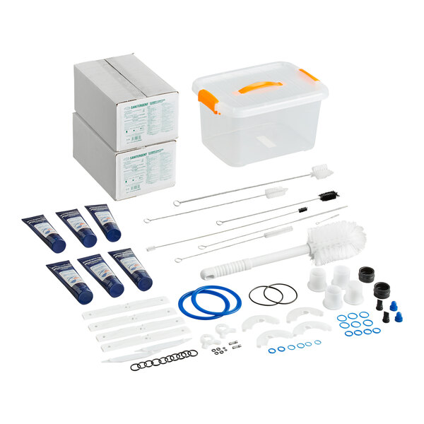 A maintenance kit for Spaceman 6236A-C soft serve ice cream machines, including brushes, gaskets, lubricants, O-rings, and cleaning accessories.