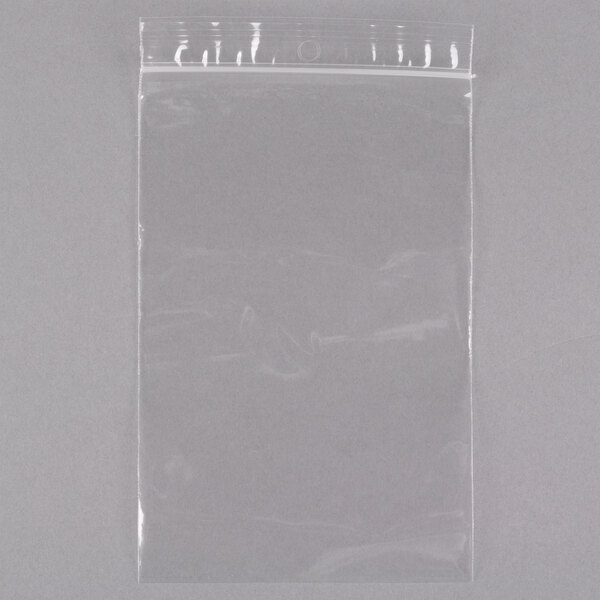 A close-up of a clear LK Packaging plastic food bag with a zip lock and hang hole.