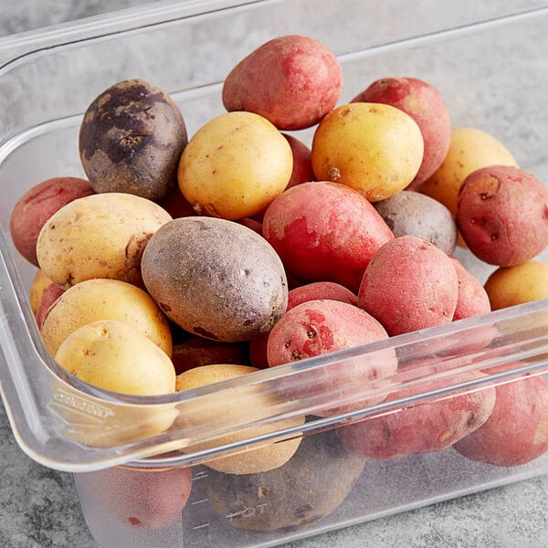 Different types of potatoes in a clear container