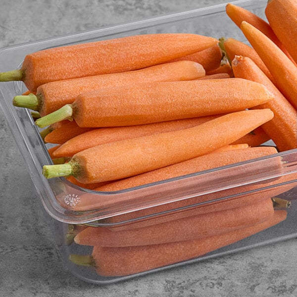 A clear plastic container of Fresh Hand-Peeled Baby Carrots.
