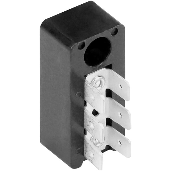 A black rectangular Solwave terminal block with metal parts.