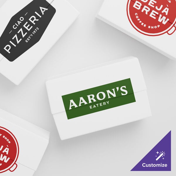 A group of white Choice customizable take-out boxes with a fast top.