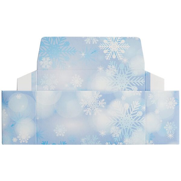 A blue and white candy box with snowflakes.